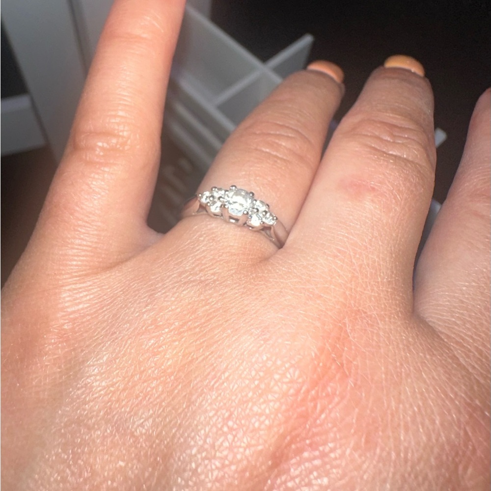 Classic Silver Ring with Diamond Center Stone and Side Accents